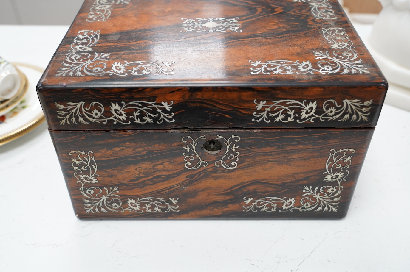 A Victorian mother-of-pearl inlaid rosewood toilet box, 29cm wide. Condition - fair
